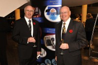 Paul and John Downs at the Telecommunications Hall of Fame. In 2009, they received the Hall of Fame's Career Service Award. In 2011, Paul was appointed to the Hall of Fame Foundation's board of governors. (Photo: Nexicom)