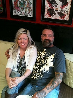 Mike, pictured here with Chelsea Munro, has been at his Water Street location for more than six years