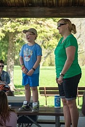 Ethan stands on a picnic table to thank his friends and family for supporting him these last three years (photo: Pat Trudeau)