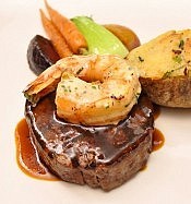 Rare's regular menu features entrées like this six-ounce grilled filet of Ontario beef, topped with a large grilled shrimp (photo: Julie Gagne Photography)