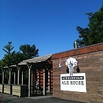 The view of the east side of the newly renovated building, where Strong Man Dan is immortalized in the logo (photo: Carol Lawless)