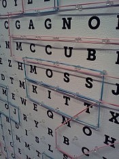 One wall of the main gallery features a giant word search that displays the names of each artist ever to show at Artspace