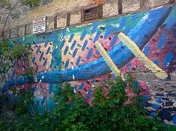 Though not strictly graffiti, this mural in the alley behind the BMO building at Simcoe and Water is an abstract staple of the Water Street landscape