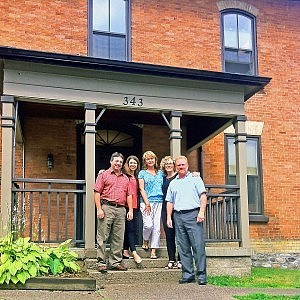 Tom Bennett, Sheri Dietrich, Kendra Buckton, Cathy Burningham, and Ben Shaunghnessy at the Stoneguide Realty office at 343 Stewart Street in Peterborough