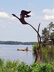 One of David's beautiful sculptures of a bird in flight, in summer by the lake (photo: David Hickey)