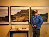 Arnold Zageris posing in front of his stunning triptych "Tom's Cabin". This image doesn't do it an ounce of justice. You have to be there to see the incredible detail.