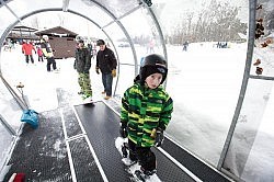 Sir Sam's climate-controlled covered ski lift is the first of its kind in Canada