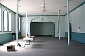 The old phonograph found in the basement looks pretty forlorn, but the auditorium will soon be filled with the 14 photo collages of artist Anne Gaensbauer's "Nature's Cross and Spirit Rising" (photo: Paul Oldham)