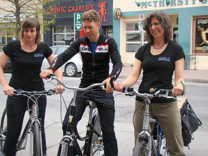 Shifting Gears Ambassador Brianna Salmon, Kieran Andrews of Wild Rock Outfitters, and Sue Sauve of the City of Peterborough show off their bikes for the kick off of the Shifting Gears Workplace Challenge (photo: Peterborough GreenUP)
