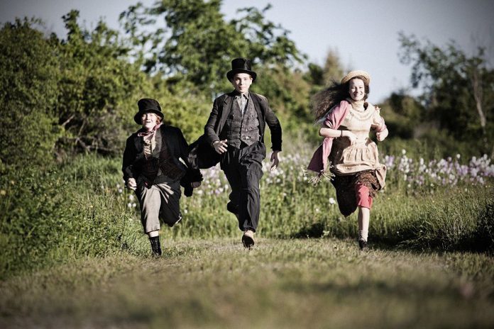 Liam Davidson as young Billy Fiddler, Justin Laurie as young Walter White, and Francis Loiselle as young Lily White (photo: Wayne Eardley, Brookside Studio)