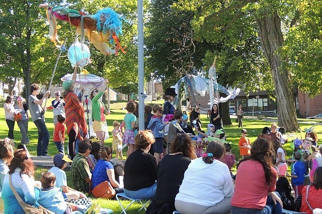 A full procession of merry-makers and cheerful onlookers at Atelier Ludmila's performance in Victoria Park last year (photo: T. Wilson)