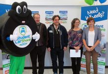 Wheelie, the Student Car Share mascot, was in Peterborough this time last year to celebrate the launch of the the second Student Car Share vehicle in the city. From left: Peterborough MPP Jeff Leal, Student Car Share CEO Michael Lende, Susan Sauve from the City of Peterborough, and GreenUp's Brianna Salmon. (Photo: Peterborough GreenUP).