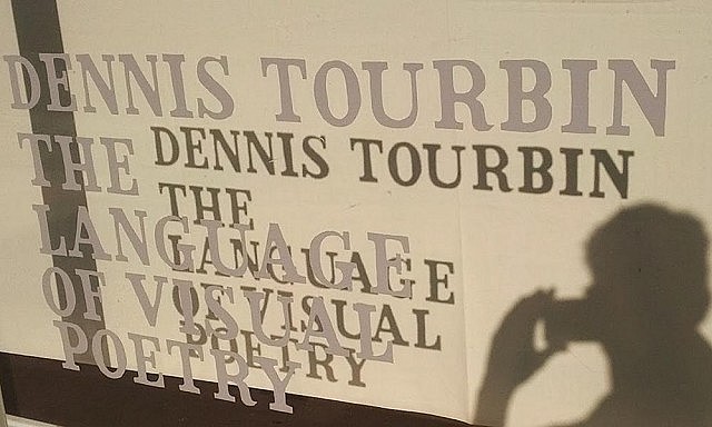 Even the sign at Artspace heralding the Dennis Tourbin show gets a little play at how words are represented and presented
