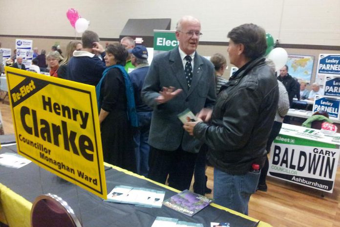 Donna Clarke scans the crowd as husband Henry speaks to an interested voter at Electionfest, held on October 22 at the Envinrude Centre (photo: Sam Tweedle)