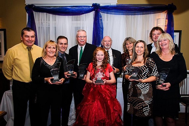Kawartha Chamber of Commerce & Tourism's 15th Annual Awards of Excellence winners. Left to right: Mike and Eileen Williams, Lakeside Cottages (Outstanding Business Achievement); Endrit Karaj, Pizza Alloro (Business Beautification); Terry Wiegard, Warsaw Caves Conservation Area & Campground (Tourism/Hospitality); Faith Dickinson, Cuddles for Cancer (Citizen of the Year); Bill Corbett, Lakefield & District Lions Club (Not-For-Profit Excellence); Ada Wilkins, Adventure Outfitters (Retailer of the Year); Dana Heard, Marlin Travel (Customer Service Excellence); Karl and Deb Kustor, Harbour Town McCracken's Landing (Entrepreneur Innovation); not pictured: Ryan Freeburn, FreeFlo Physiotherapy (Young Professional). (Photo: Woodhouse Photography.)