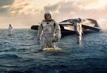 A scene from Interstellar, where the exploratory team lands a water planet whose proximity to a black hole slows down the passage of time