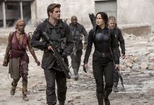 Liam Hemsworth as Gale Hawthorne and Jennifer Lawrence as Katniss Everdeen in the latest installment of the blockbuster young adult franchise