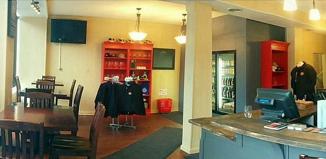 The store features a large and well-stocked cooler, Publican House merchandise, a tasting bar, and a seating area where customers can enjoy some of the brewery’s award-winning brews (photo courtesy of Publican House Brewery)