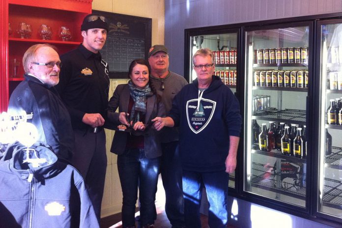Publican House Partners Marty Laskaris, Matt Philips, Mike Laskaris, and Rick Coit in the brewery's new craft beer retail store, along with City of Peterborough Town Ward Councillor Diane Therrien. The store will have its official opening on Saturday, January 31st (photo courtesy of Publican House Brewery)