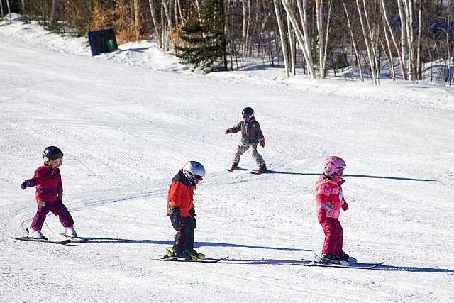 The main runs and terrain park are visible from the chalet's sundeck, so parents can take a break and watch their kids ski