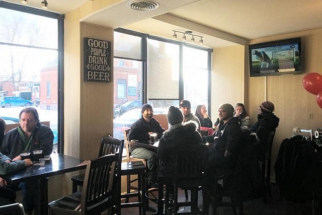 Happy customers enjoying some brews in the seating area during the grand opening on Saturday, January 31 (photo courtesy of Publican House Brewery)