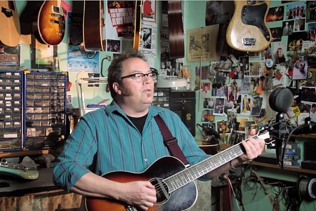 Rick Fines performs at the Hank To Hendrix repair shop in Peterborough during a filming session with Jeremy Kelly of filmkelly.ca (photo: Jeremy Kelly)