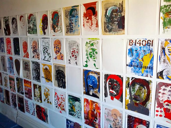 Brian Nichols' silk-screened faces are on display at Peterborough's Gallery in the Attic during the month of March