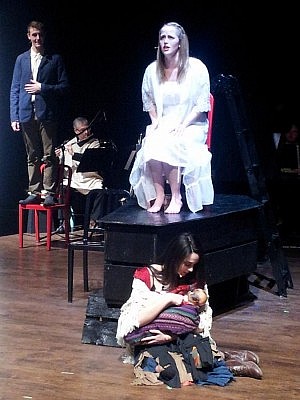 With a voice like an angel's, Sophie Robinson is delightful as Joanna, pictured her with Erik Feldcamp (on chair) as her suitor Anthony and Kyla Piccin (on floor) as a beggar/prostitute (photo: Sam Tweedle / kawarthaNOW)