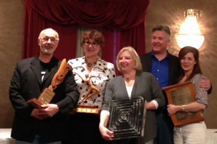 Members of the Peterborough Theatre Guild with their awards from the Eastern Ontario Drama League, which included "Acting Excellence", "Best Visual Presentation", "Best Actress in a Leading Role", and the top prize of "Best Production" (photo courtesy of Peterborough Theatre Guild)