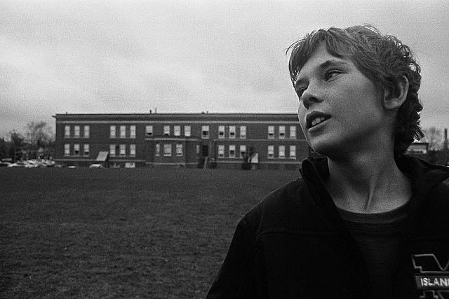 Simple and well composed, this portrait even seems to be taken an bit "out of time" with the old school in the background (photo courtesy of Wayne Eardley)