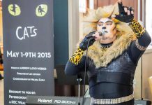 Danny Bronson, in full costume and makeup as Rum Tum Tugger, performed the song "Mr. Mistoffelees" from "Cats" for the lunch-time crowd at Lansdowne Place on Saturday, April 4th. The Peterborough Theatre Guild production of the Andrew Lloyd Webber musical runs for seven performances only, May 1 to 9 at Showplace Performance Centre in Peterborough. (Photo: Linda McIlwain / kawarthaNOW)