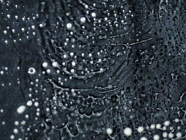 This close-up of McClellan's HD on metal print of water and concrete takes on the kind of detail and construction of a linear painting (photo courtesy of Holly McClellan)
