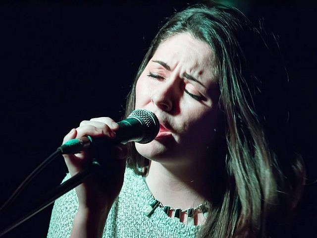 A familiar voice in the Peterborough music scene, singer Missy Knott has been writing and recording in Nashville with award-winning country music artist Crystal Shawanda. Pictured is Missy performing at the Red Dog Olde Christmas Pageant in Peterborough last December. (Photo: Linda McIlwain)