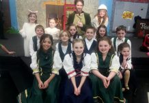In the St. James Players family production of "Pied Piper: The Musical", Terry Convey stars as The Pied Piper along with Mackenzie Airhart as Kittykat, Sophie Wigglesworth as Pattycake, Emma Poley as Dilly, and more (photo: Sam Tweedle / kawarthaNOW)