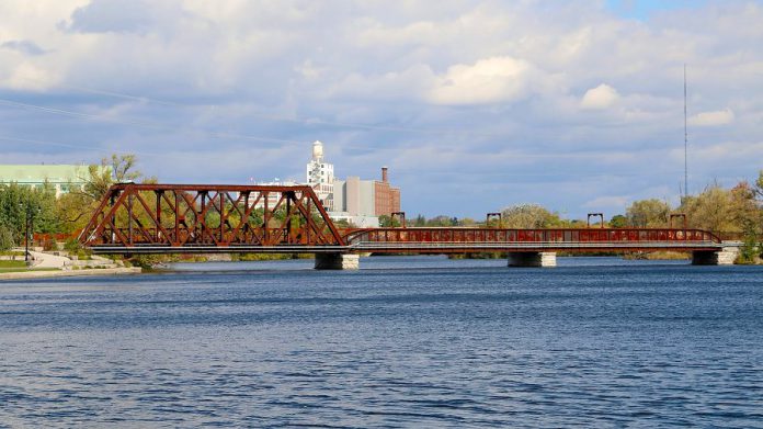 The popular trail bridge linking East City with downtown Peterborough will close for a month this summer so that the City of Peterborough can complete concrete repairs delayed from last year (photo: Bob Linsdell)