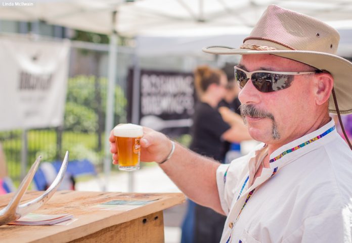 One of the thousands of people who sampled a Kawarthas-area craft beer at the inaugural Kawartha Craft Beer Festival in downtown Peterborough on Saturday (photo: Linda McIlwain)