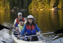 Paddling on a lake is a great way to spend time with family, and research shows that exercise in nature has a more positive effect on blood pressure and mood than exercise in a gym (photo: Ontario Parks)