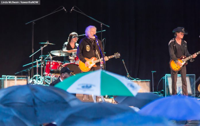 Despite heavy rain, Randy Bachman performed at the opening concert of the 29th season of Peterborough Musicfest on Saturday, June 27 (photo: Linda McIlwain / kawarthaNOW)