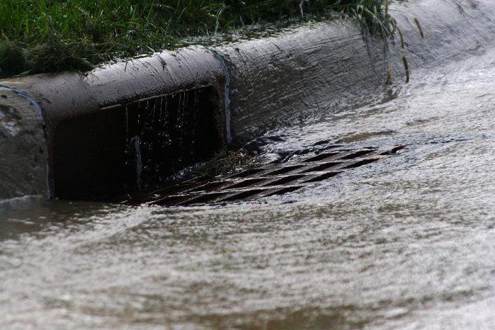 Storm water runoff carries pollutants commonly found on streets and other paved surfaces like pet waste, motor oil, cleaners and other chemicals directly into waterways. Using rain barrels, picking up after your pet, and reducing paved surfaces are all ways we can reduce storm water runoff and keep our waterways cleaner. (Photo: Wikipedia)