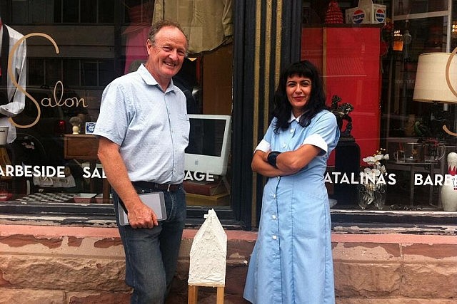 Artist Patrick Moore and Catalina Motta outside Catalina's Salon, one of the storefronts to be transformed by art in BLINK.