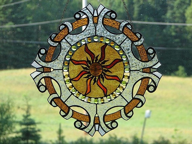 This sunny stained-glass suncatcher from Margo Merritt is exquisitely crafted and strikes a perfect balance between cheerful and refinement.