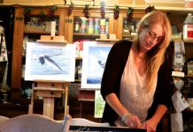 Artist Victoria Wallace at work in her studio where realism and her fascination with surrealism and the circus often collide. Wallace is one of the artists you can see in the Kawartha Autumn Studio Tour during the first weekend of fall.