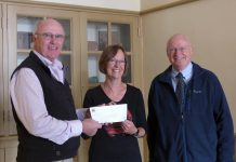 Paul and John Downs of Nexicom present a $5,000 cheque to Celia Hunter of the Millbrook & Cavan Historical Society (photo courtesy of Nexicom)