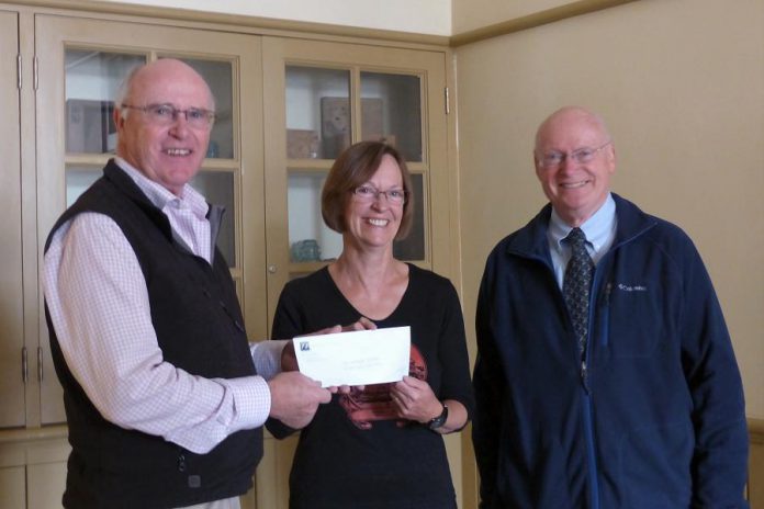 Paul and John Downs of Nexicom present a $5,000 cheque to Celia Hunter of the Millbrook & Cavan Historical Society (photo courtesy of Nexicom)