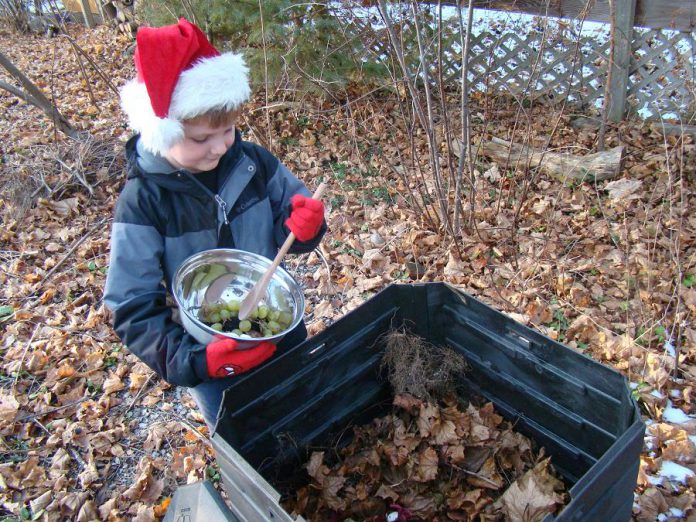 Abner Jarvis helps reduce waste in his home by composting all year long. The varying temperatures that are typical this time of year assist your compost pile to break down, and will do so all winter long. (Photo: Karen Halley, GreenUP)