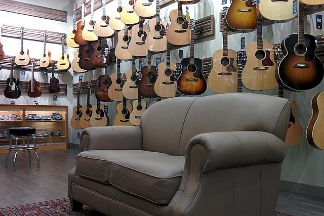 The guitar-playing couch in the acoustic room is a nice touch