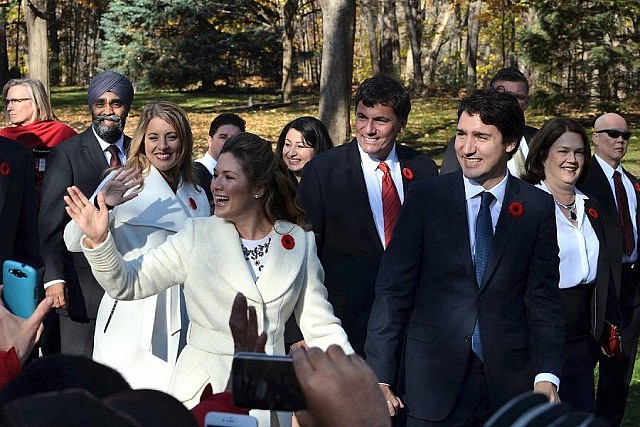 Peterborough-Kawartha MP Maryam Monsef (centre back) as she accompanies Prime Minister Justin Trudeau and other MPs to swearing-in ceremony at Rideau Hall in Ottawa on November 4. Monsef was appointed to the position of Minister of Democratic Institutions and, at the age of 30, is the second-youngest cabinet minister ever. (Photo: Steve Boyton for kawarthaNOW)