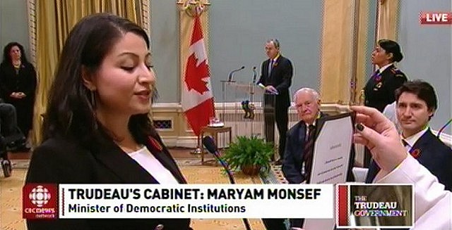 Peterborough-Kawartha MP Maryam Monsef being sworn in as Minister of Democratic Institutions as Prime Minister Justin Trudeau looks on (photo: CBC Television)