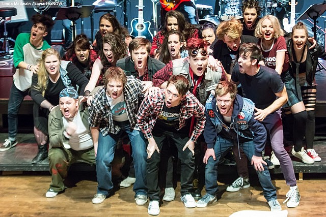 The cast of "American Idiot" with Andrew Little (Will), Ryan Hancock (Johnny), and Taylor Beatty (Tunny) in the first row. The production, featuring the music and lyrics of Green Day, ran for six performance only at Peterborough's Market Hall in December. (Photo: Linda McIlwain / kawarthaNOW)