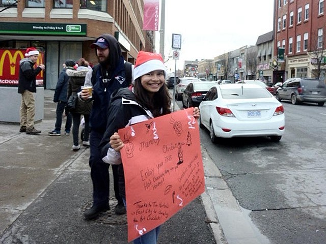 The students offered free hot chocolate (donated by Tim Hortons) to passersby while collecting donations